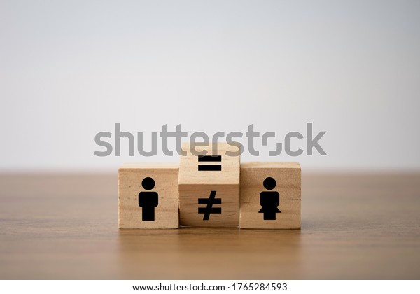 Flipping of unequal to equal sign between\
man and woman. Human and business right concept.\
