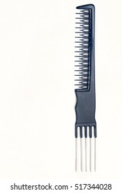 Flipside comb with metal teeth on white background