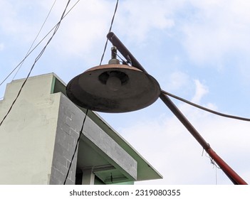 a float hanging from a pole with a clear sky