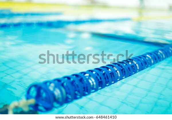 Float lane in swimming\
pool, closeup