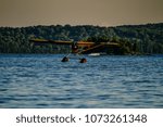 Float plane landing in water