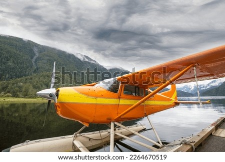 Float Plane in the mountains lake, Canada
