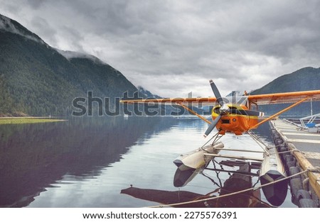 Float Plane in the mountains lake, Canada