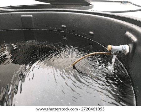 float valve installed inside a PE water tank for cold water plumbing
