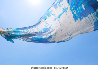 A Floating Blue Scarf.