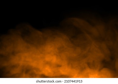 floating brown steam smoke with from the humidifier on a black background - Powered by Shutterstock