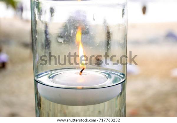 Floating Candle Lit Glass Vase Beach Stock Photo Edit Now 717763252