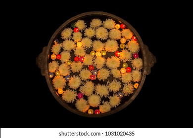 Floating candles and white Chrysanthemum flowers. View from top - Powered by Shutterstock