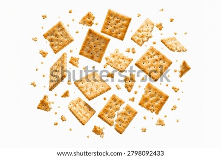 floating cracker composition featuring whole baked crackers, broken cracker pieces, crispy cracker fragments, and natural crumbs suspended in mid air. Isolated on a pure white background with authentic golden baked texture, realistic crunchy appearance, subtle browning, and soft natural shadows. Professional commercial food photography ideal for snack packaging, food advertising, bakery products, healthy snack concepts, appetizer promotions, grocery marketing, and commercial branding. High resolution stock image with clipping path style presentation and premium microstock quality.