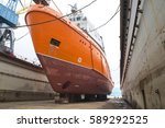 Floating  Dock  preparing  to dive, to  bring  the  repaired  ships  at  sea