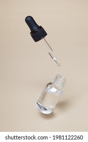 Floating Glass Dropper Bottle With Serum Or Oil And Flying Pipette