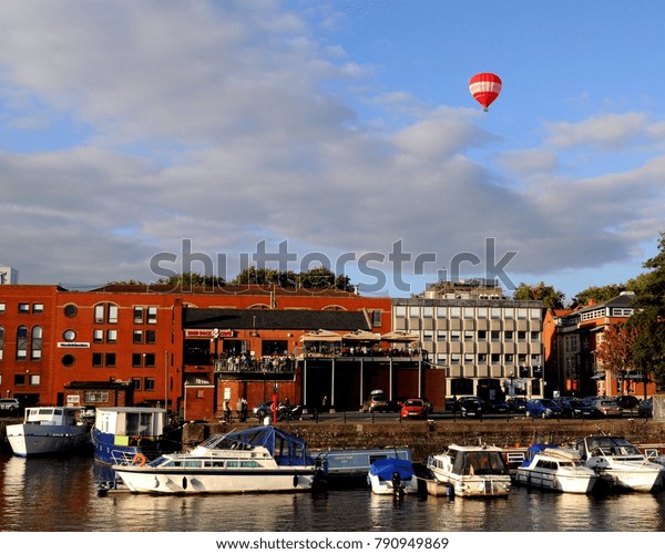 Floating Harbour, Bristol / UK -\
09/25/15: Red Letter Days hot air balloon over Mud Dock\
Café.
