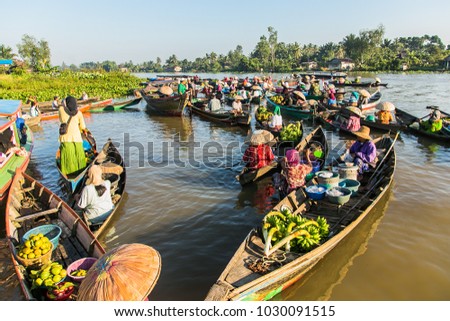 Floating market in Borneo, kalimantan where dealer sell fruit and vegetables