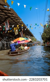 The floating market of Damnoen Saduak near Bangkok in Thailand