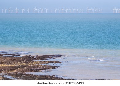 Floating Offshore Wind Farms At Horizon Seen From Stone Bay In The Seaside Town Of Broadstairs, East Kent, England