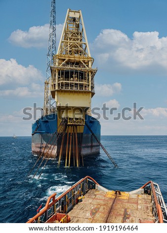 Floating production storage and offloading FPSO vessel, oil and gas indutry. View from ship. Supply DP operations