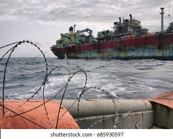 Floating Production Storage Offloading Unit (FPSO) And Vessel Working Offshore In Equatorial Guinea