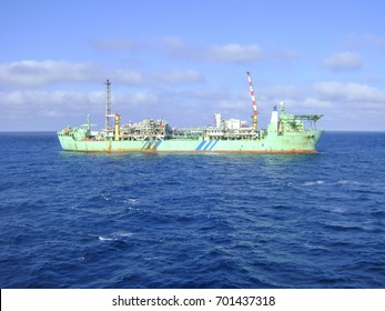 Floating Production Storage And Offloading Vessel In Operation At Sea, Producing Oil And Gas