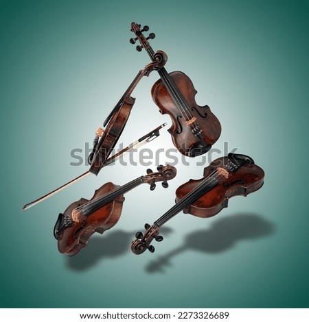 Floating Set of classical violin instrument  on green gradient background