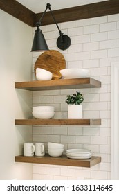 floating shelves in a kitchen - Shutterstock ID 1633114645