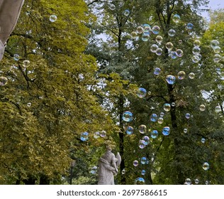 Floating Soap Bubbles and Classical Statue