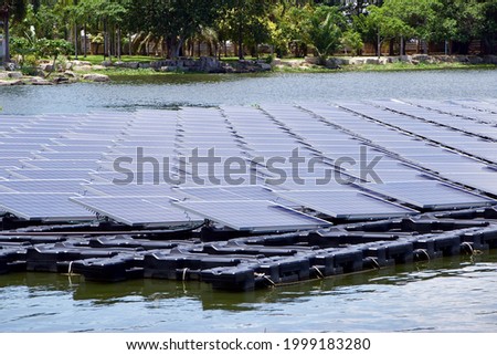 Similar – Image, Stock Photo Energy transition: A photovoltaic (solar) system in the forest among bushes and flowers and in front of trees. Photo: Alexander Hauk