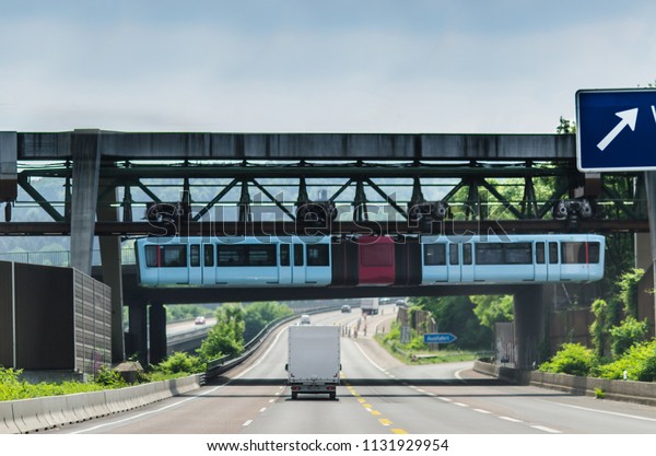 Floating tram in\
Wuppertal, over\
autobahn