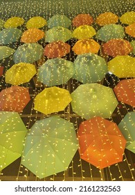 Floating Umbrellas Under A Starry Light