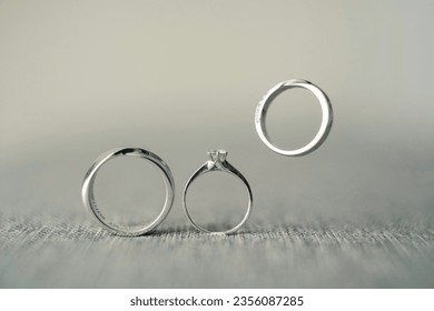 Floating wedding ring creative photo - Powered by Shutterstock - Get 15% off with code: PIKWIZARD15