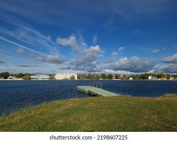 Floating Wooden Dock In A Lake On Summer Day