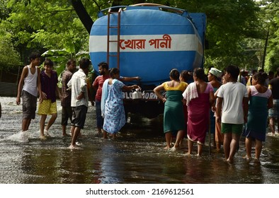 Flood Affected Villagers Collect Drinking Water From A Vehicle   In Kamrup District Of Assam India On Monday 20th June 2022.