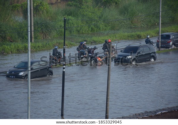 flood atmosphere in the middle of an\
urban area in Sidoarjo: Indonesia - January 12,\
2019