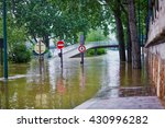 Flood in Paris, extremely high water on the river Seine, road signs covered with water