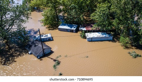 Flood Waters Totally Submerge Homes And Buildings As Hurricane Harvey Destroys Everything Along The Texas Gulf Coast August 30th 2017 Drone View Above Houses