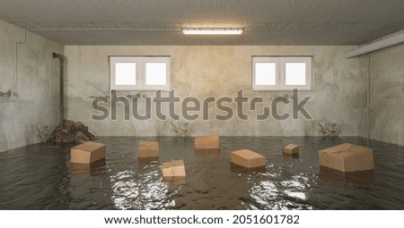 flooded basement of the house with wet Cardboard boxes in the water 
