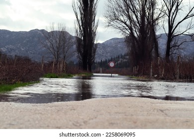 Flooded fields and roads in winter - Shutterstock ID 2258069095
