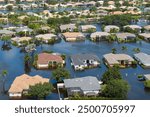 Flooded houses from hurricane Debby rainfall water in Laurel Meadows community in Sarasota, Florida. Aftermath of natural disaster in USA south