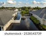 Flooded residential area with underwater houses from hurricane rainfall water in Florida suburban community. Aftermath of natural disaster in southern USA