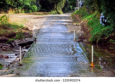 Flooded Road Over Stream In New Zealand – Wentworth Valley, Coromandel, North Island, New Zealand