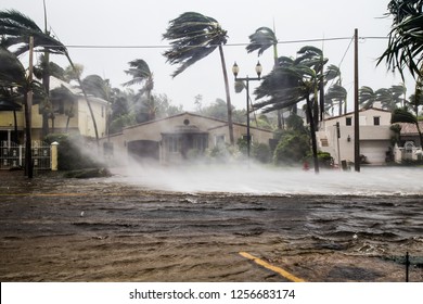 A flooded street after catastrophic Hurricane Irma hit Fort Lauderdale, FL. - Shutterstock ID 1256683174