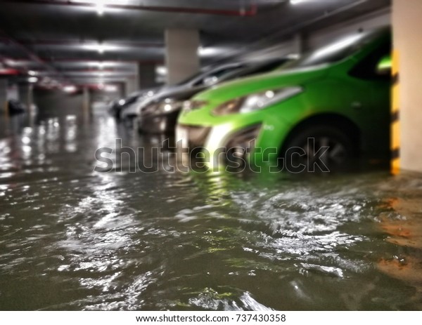 flooding car in  basement carpark at\
condominium\
,Bangkok,Thailand