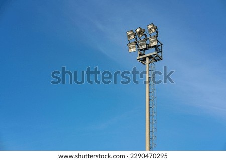 Floodlights over a sports field in Luino, Italy.