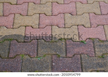 floor beige pink autoblock slabs pavement clean dirty with high-pressure jet before and after cleaning 