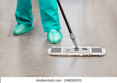 Floor Care And Cleaning Services With Washing Mop In Sterile Operating Room Or Clean Hospital