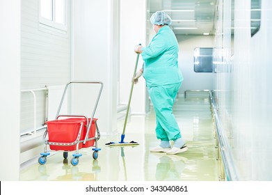 Floor care and cleaning services with washing mop in sterile factory or clean hospital 