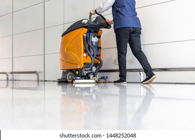 floor care with machine in airport