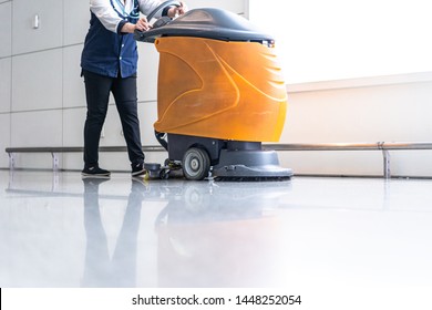 floor care with machine in airport