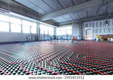 Floor heating in a new building. Interior design and finishing industry. Office and apartment