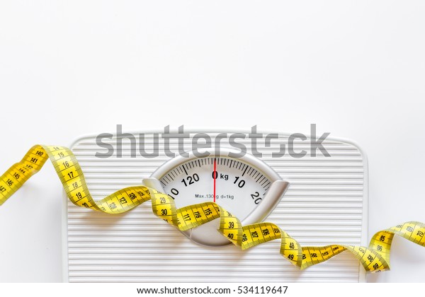 floor scale and centimeter to measure white
background top view