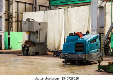 Floor Sweeper And Washer Scrubber Drier Car In An Industrial Building Engineering Workshop